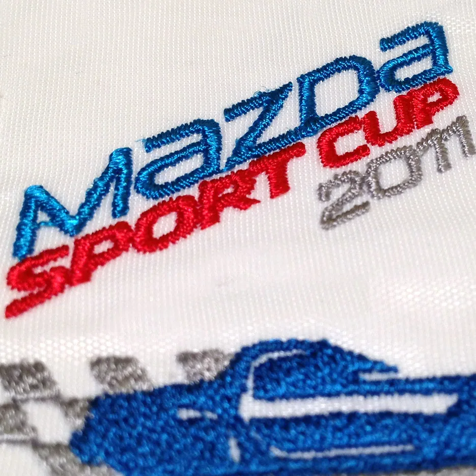 Mazda Sport Cup — Мультицветная вышивка крупным планом